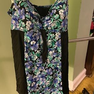 One piece bathing suit. Never worn. Size 18.